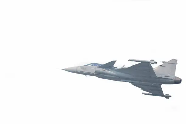 Photo of The Gripen plane above the horizon