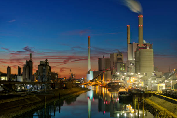 istock Power Plant on a Canal Illuminated at Night 1133169710