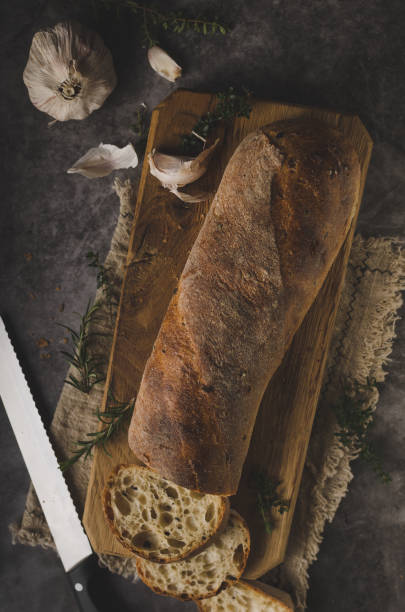istock Homemade baguette with herbs 1133172064