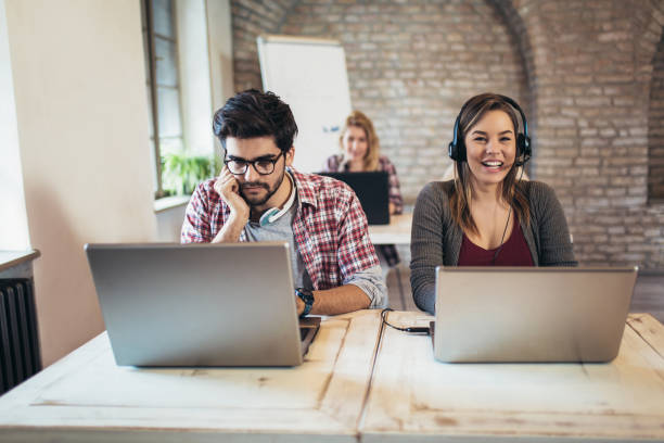 istock Portrait of happy smiling customer support phone operator at workplace. 1133172173