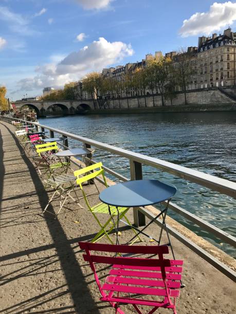istock Bistro tables on the river Seine, Paris 1133174754