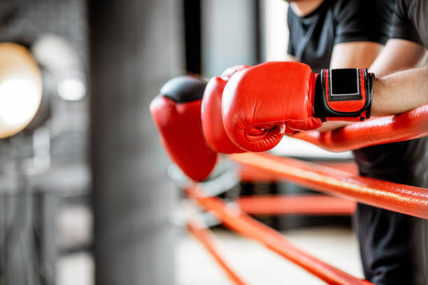 istock Boxing gloves on the ropes 1133176314