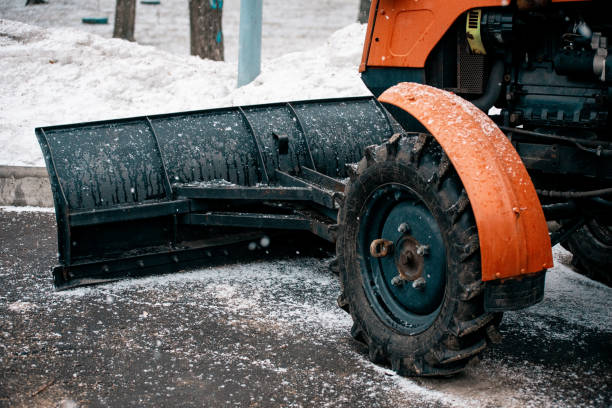istock Black big wheel from the tractor. Snowblower 1133177581