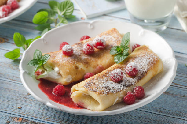 Cheese blintzes pancakes with fresh fruit