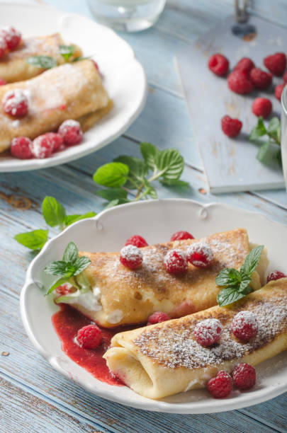 istock Cheese blintzes pancakes with fresh fruit 1133177904