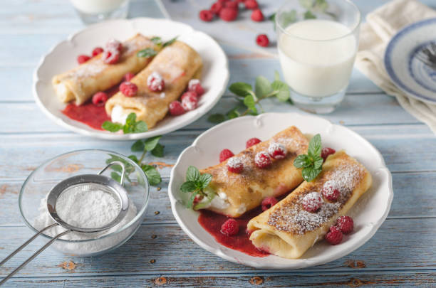 istock Cheese blintzes pancakes with fresh fruit 1133178022