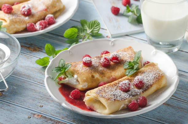 istock Cheese blintzes pancakes with fresh fruit 1133178859