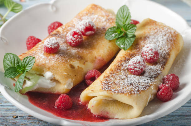 istock Cheese blintzes pancakes with fresh fruit 1133179028