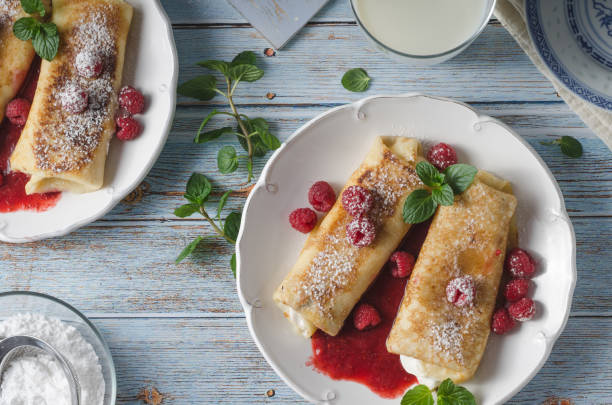 istock Cheese blintzes pancakes with fresh fruit 1133179528