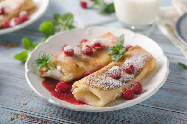 istock Cheese blintzes pancakes with fresh fruit 1133179568