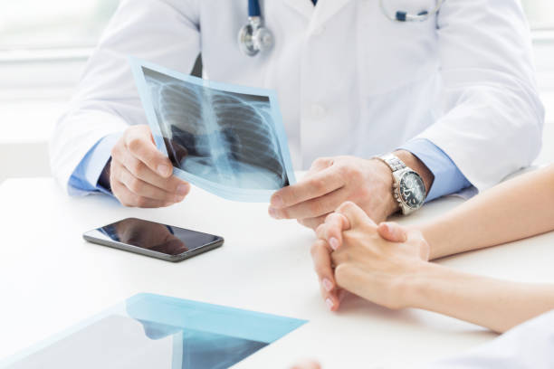 istock Medical colleagues discuss x-ray 1133179598