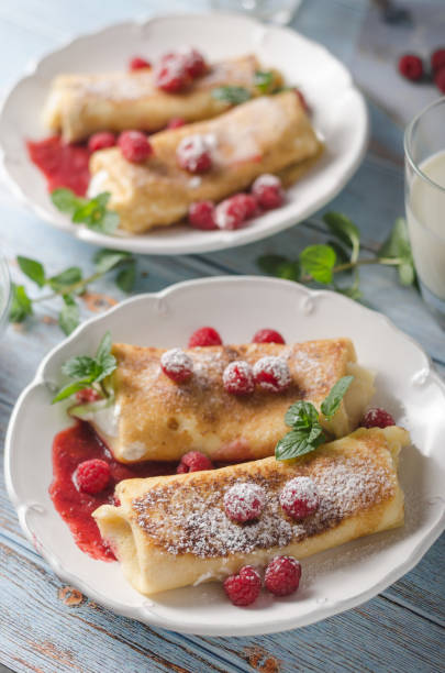 istock Cheese blintzes pancakes with fresh fruit 1133180411