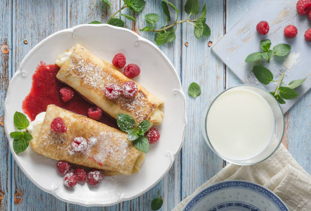 istock Cheese blintzes pancakes with fresh fruit 1133180640