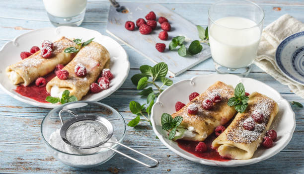 istock Cheese blintzes pancakes with fresh fruit 1133180934