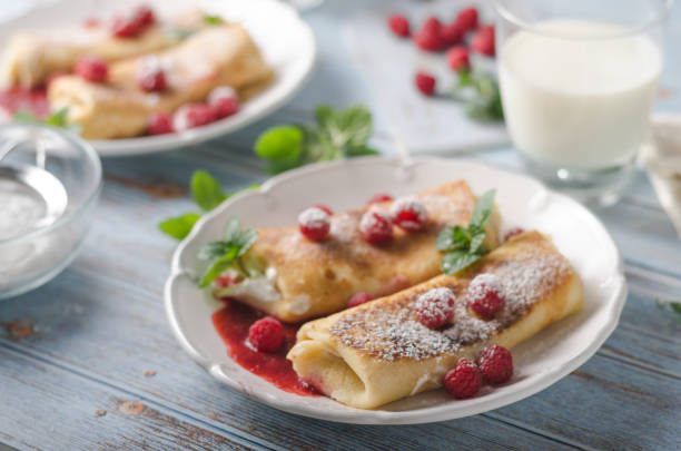istock Cheese blintzes pancakes with fresh fruit 1133181122