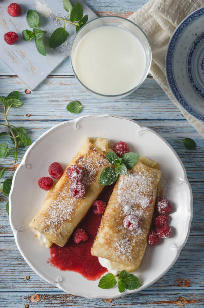 istock Cheese blintzes pancakes with fresh fruit 1133181239