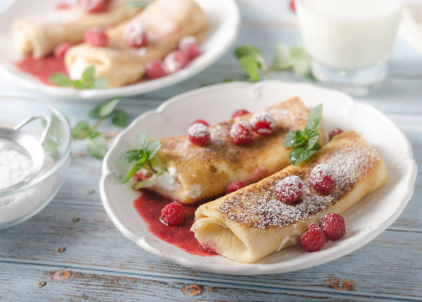 istock Cheese blintzes pancakes with fresh fruit 1133181254