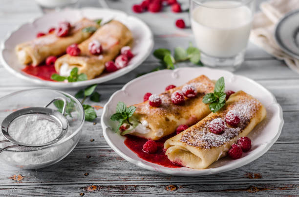 istock Cheese blintzes pancakes with fresh fruit 1133181282