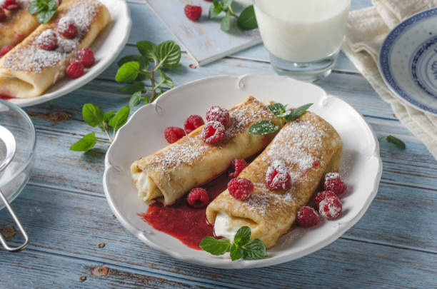 istock Cheese blintzes pancakes with fresh fruit 1133181978