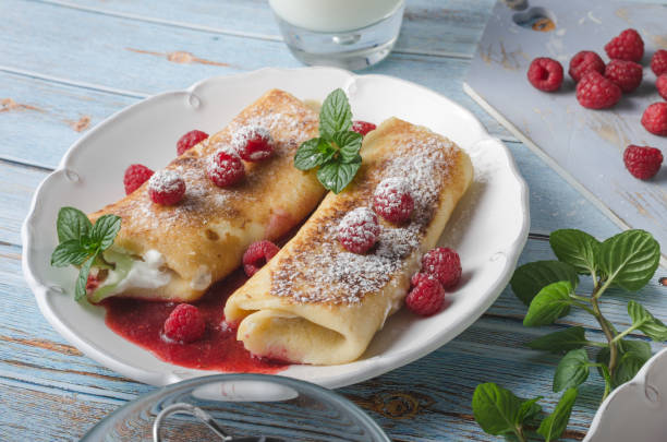 istock Cheese blintzes pancakes with fresh fruit 1133182253