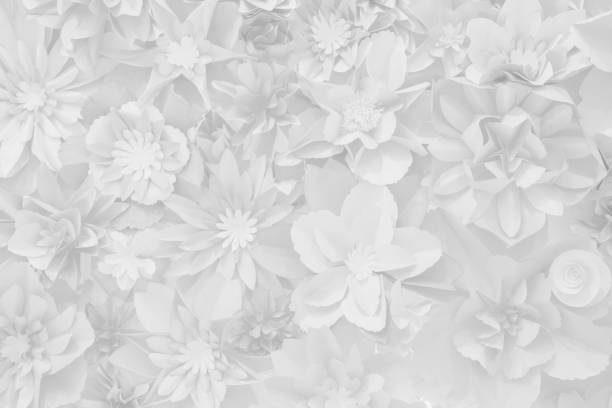 istock Beautiful white decoration artificial paper flowers background for backdrop. 1133185225