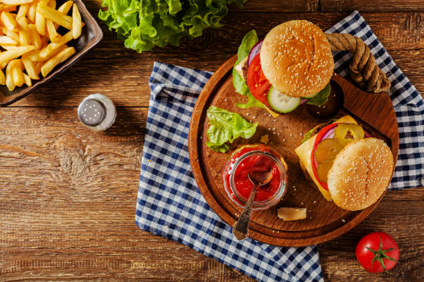 istock Homemade, beef hamburger with cheese and vegetables. 1133186439