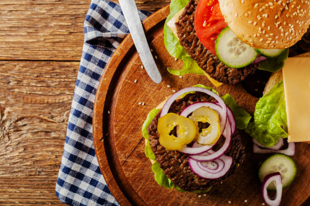 istock Homemade, beef hamburger with cheese and vegetables. 1133186446