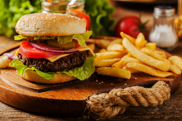 istock Homemade, beef hamburger with cheese and vegetables. 1133186492
