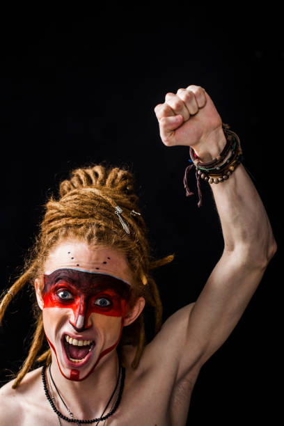 istock young man with face painting 1133190284