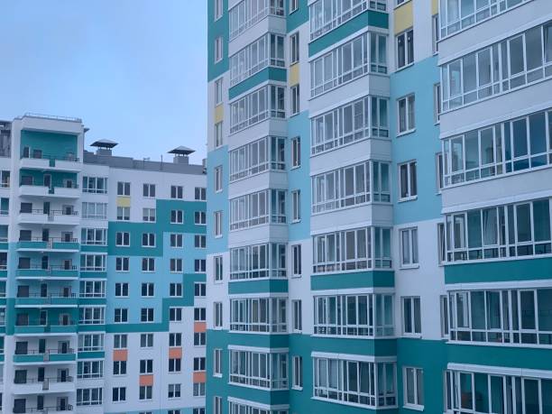 istock Beautiful multi-colored multi-storey residential building in a residential area. 1133190592