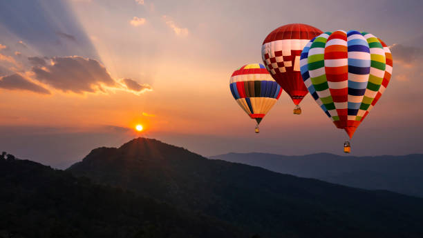 istock Colorful hot air balloon fly over mountain view 6 1133193696