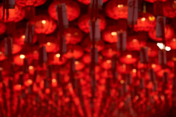 Background of blurred red chinese lantern hanging in the temple