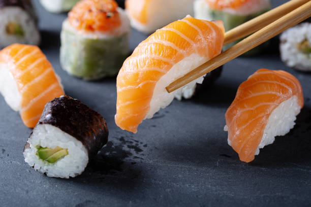 istock Fresh seafood sushi meal on darck background 1133197260