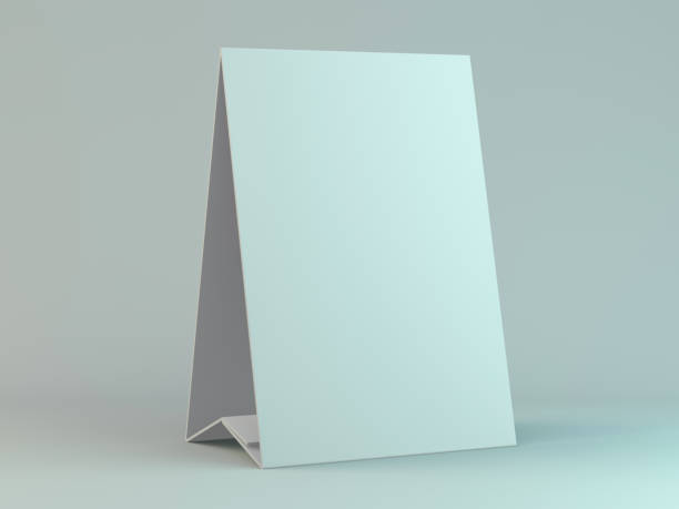 istock Empty desk calendar on table. Mockup design concept. 3D 1133198203