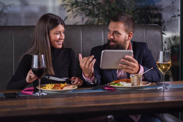 istock Business partners sharing ideas at meeting 1133202328