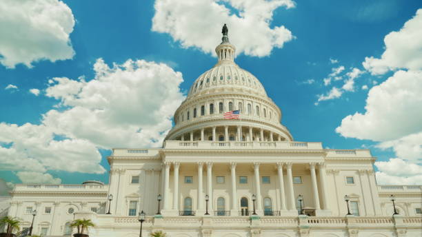 istock Over the famous Capitol building in Washington, DC, clouds swiftly float 1133202467