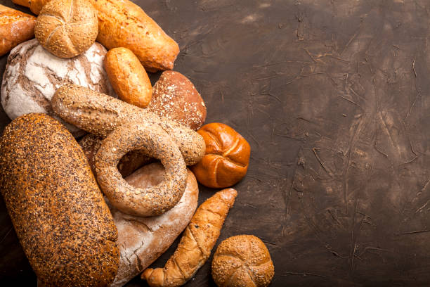 istock Assortment of baked goods on dark background 1133202494