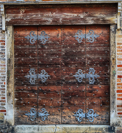 antique doors with forged locks, Venice; Italy