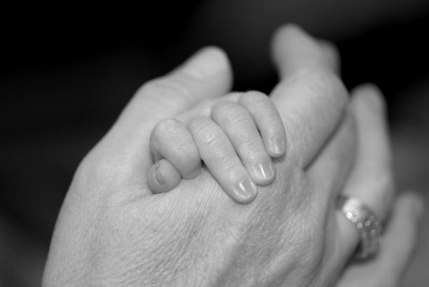 istock New Born Baby hand 1133207609