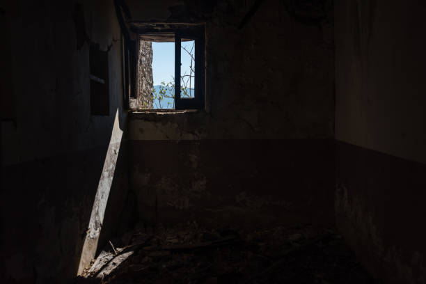 istock Looking out a Window in an Abandoned Ruin in Southern Italy 1133207648