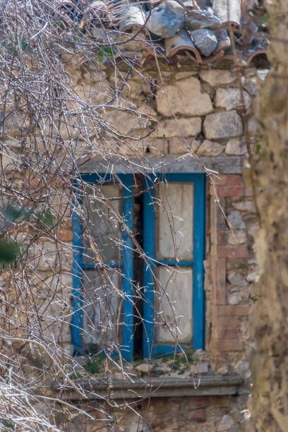 istock Window in an Abandoned Ruin in Southern Italy 1133209324