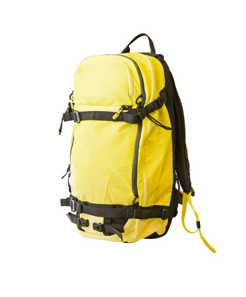 Side view of freeride backpack Side view of yellow backpack with straps for trekking, ski tours, hiking, etc. Sport equipment isolated on white background luggage strap stock pictures, royalty-free photos & images