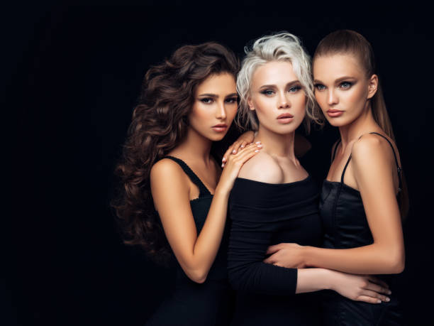 istock Three beautiful girls with make-up and hairstyle 1133210260