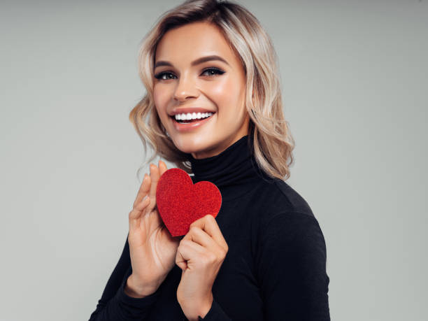 Beautiful woman with heart symbol