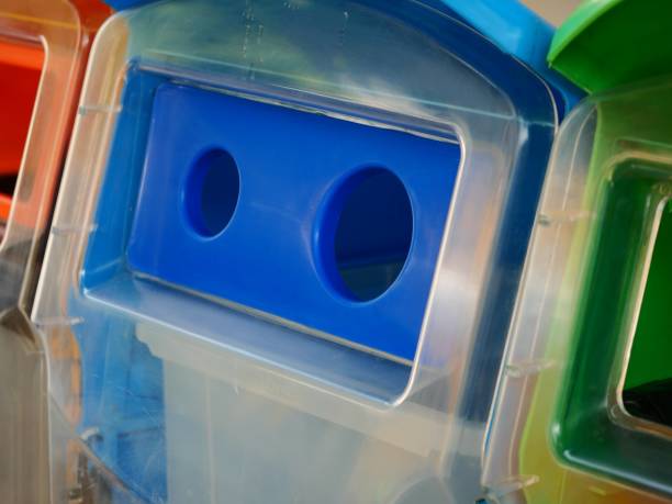 istock Yellow, green, blue recycle bins with recycle symbol 1133211403