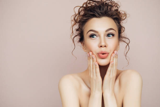 Beautiful girl with a gentle smile Beautiful girl with a gentle smile human lips photos stock pictures, royalty-free photos & images