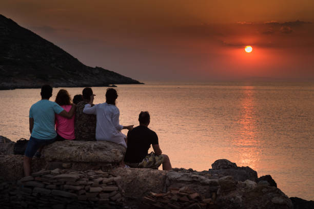 istock Friends Having good time at sunset 1133214040