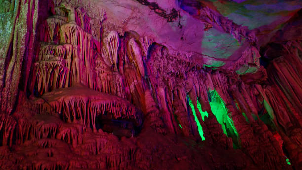 istock beautiful illuminated multicolored stalactites from karst Reed Flute cave In the cave. Guilin Guangxi China 1133218085