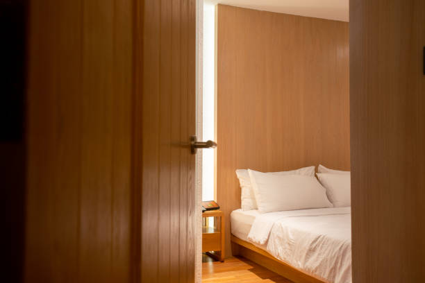 istock Bedroom door opened in the hotel 1133226723