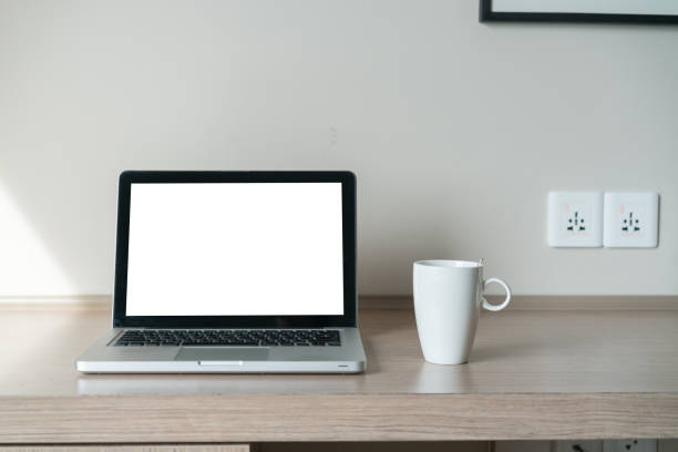 istock Laptop on a desk with lamp 1133226988